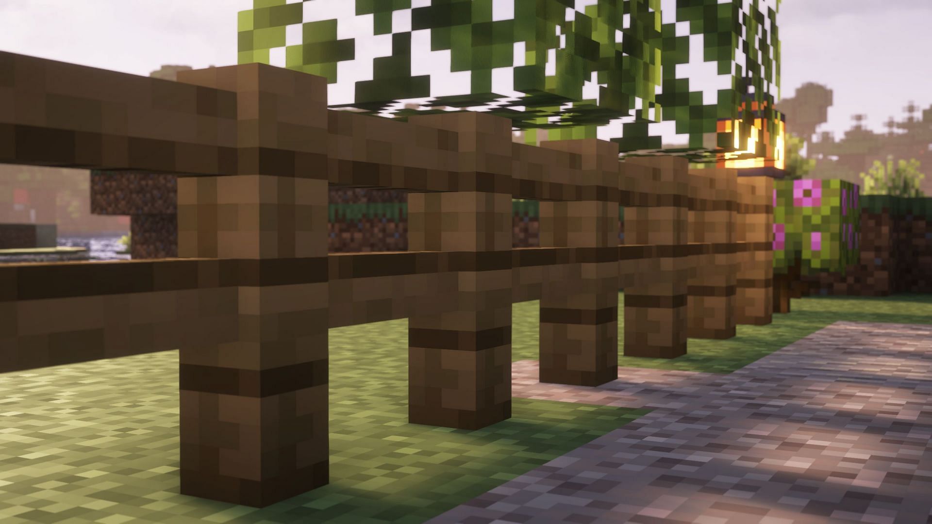 The path can be closed off with fences to prevent hostile creatures from invading (Image via Sportskeeda Gaming || Mojang Studios)